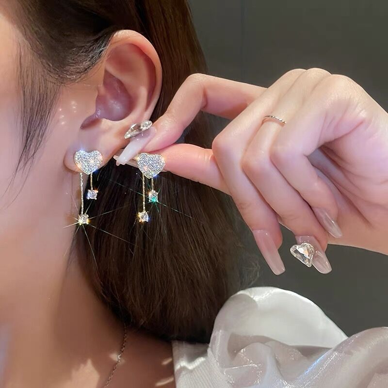 Silver Bowknot Star Tassel Earrings